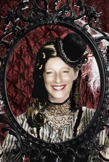 Photoshop picture of Debbbie framed in an oval picture wearing western style dress and small rounded hat in black and white with high lace collar with a victorian purple background. Very oldie worldie a happy debbie smiling her Debbie smile x